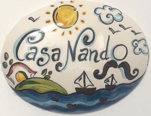 a cake with the words la nord on it at Casa Nando Relax e comfort home in Marina di Ascea