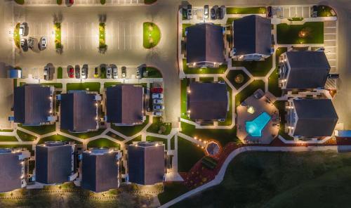 an aerial view of a parking lot at night at Staybridge Suites Oxnard - River Ridge by IHG in Oxnard
