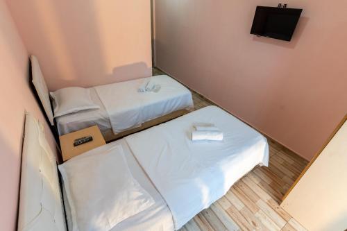 Postel nebo postele na pokoji v ubytování Hotel Ponto Vechio
