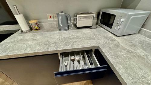 Kuchyň nebo kuchyňský kout v ubytování Stratford Apartments