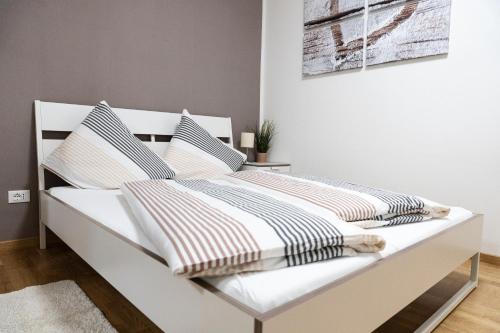 Katil atau katil-katil dalam bilik di Flow Apartments KIRCHSTEIG