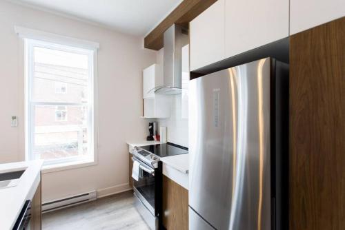 Η κουζίνα ή μικρή κουζίνα στο Fresh 1 Bdr in the Heart of Mile End by Denstays