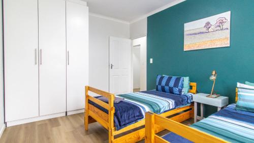 Ένα ή περισσότερα κρεβάτια σε δωμάτιο στο Casa Mia