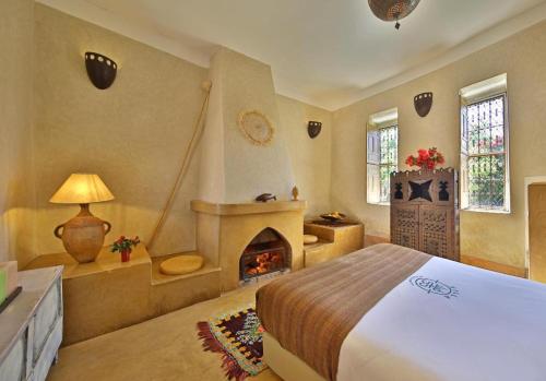 Postel nebo postele na pokoji v ubytování Villa Dar 55 - Berber House