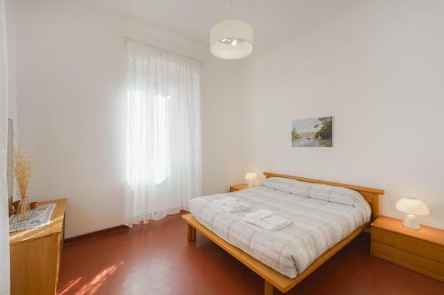 En eller flere senge i et værelse på La Casa di Gino - A due Passi dal Mare