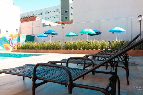 Bazén v ubytování Hotel 15 de Julho nebo v jeho okolí