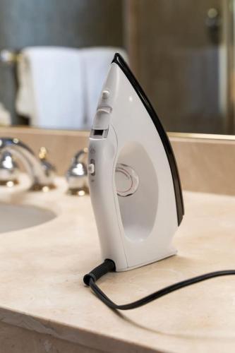 a hair dryer sitting on top of a counter at Resort Style with Balcony Hot Tub and Full Kitchen in Edgar