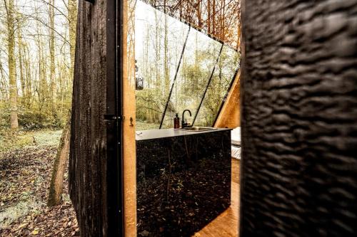 Zahrada ubytování Les frenelles, Cabane à l'orée de la forêt