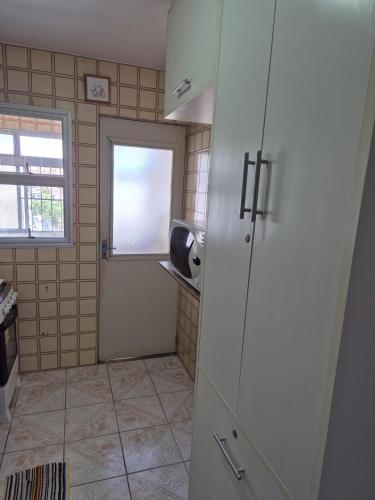Dapur atau dapur kecil di Apartamento Jardim das flores
