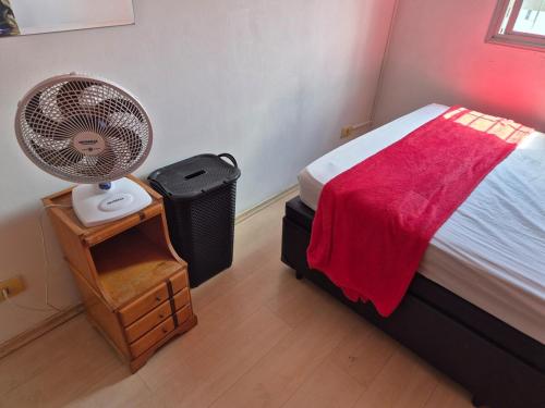 Katil atau katil-katil dalam bilik di Apartamento Jardim das flores