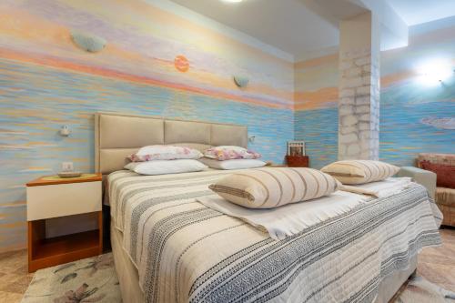 Una cama o camas en una habitación de Adriatic Apartment Neum