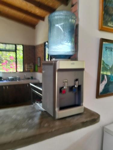 a container is sitting on top of a stove at Casa Campestre con piscina privada- Anapoima in Anapoima