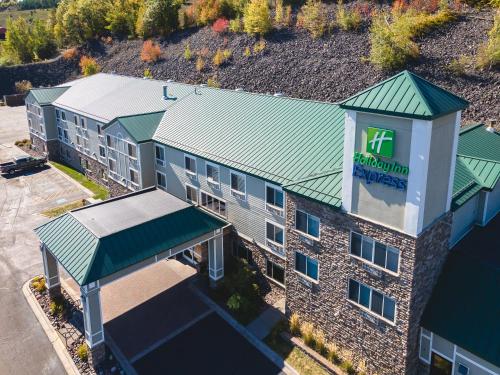 an overhead view of a building with a sign on it at Holiday Inn Express Houghton-Keweenaw by IHG in Houghton