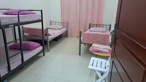 Postelja oz. postelje v sobi nastanitve Mohammad dormitory