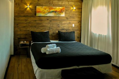Postel nebo postele na pokoji v ubytování Hotel Sonetto