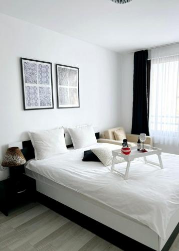 Cama ou camas em um quarto em Deva Apartments