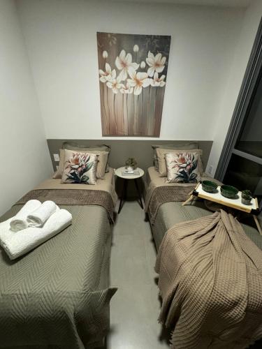 Apt 86 Fiusa One - Charmoso!にあるベッド