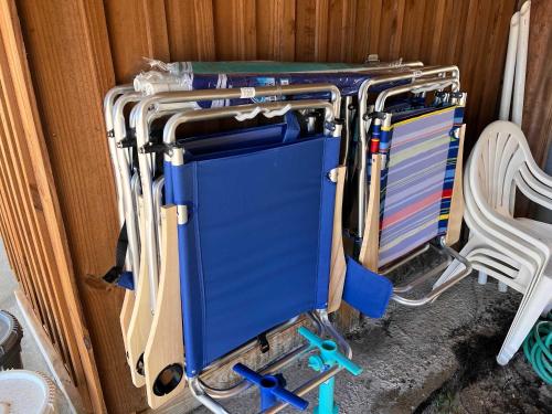 a group of suitcases are stacked against a wall at Private Beach-Private Pool-Easy walk to the Beach in Gulf Highlands