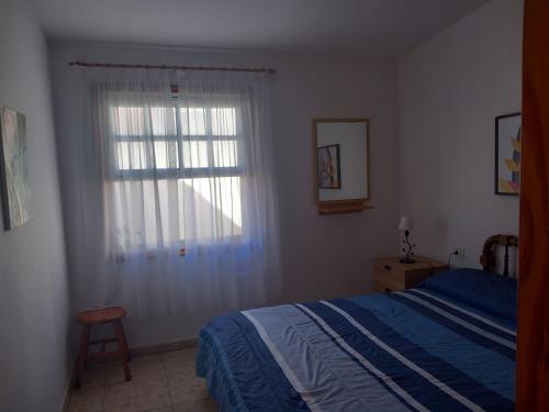 Postel nebo postele na pokoji v ubytování Casa playa Abades