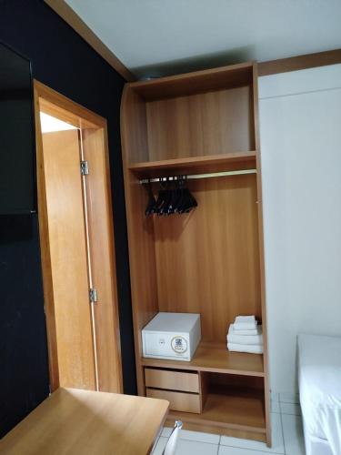 Ένα ή περισσότερα κρεβάτια σε δωμάτιο στο Golden Dolphin Grand Hotel