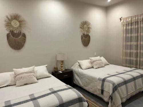 Postel nebo postele na pokoji v ubytování Casa Duna Cuatro Ciénegas