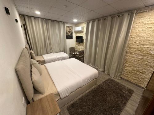 Postel nebo postele na pokoji v ubytování Egy Days Hotel