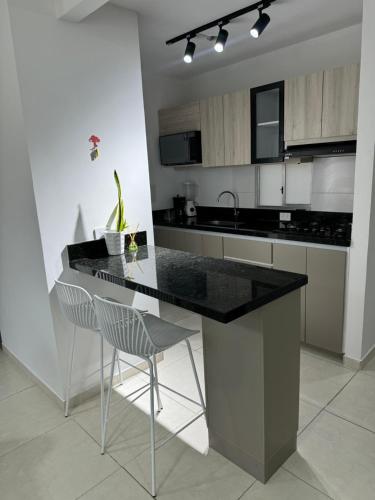 Kuchyň nebo kuchyňský kout v ubytování Hermoso Apartamento en Valledupar
