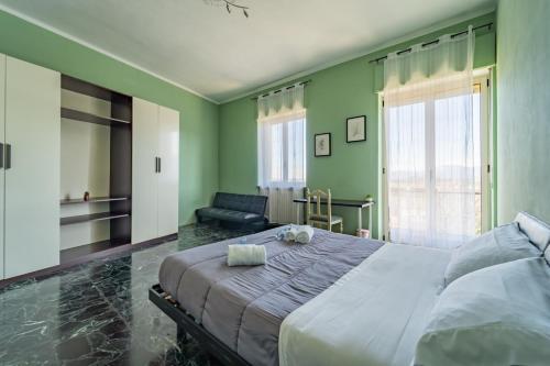 Postel nebo postele na pokoji v ubytování Casa Lungogesso