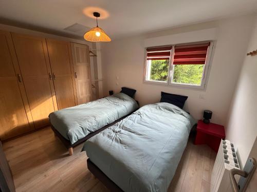 Ένα ή περισσότερα κρεβάτια σε δωμάτιο στο Appartement T1, à la campagne