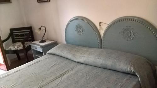 Posteľ alebo postele v izbe v ubytovaní Appartamento Tulipano