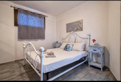 Postel nebo postele na pokoji v ubytování Tergu Apartment 10 minutes from Castelsardo