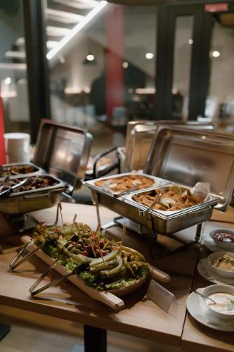a buffet with different types of food on a table at Pension Zwolenčan in Zvolen