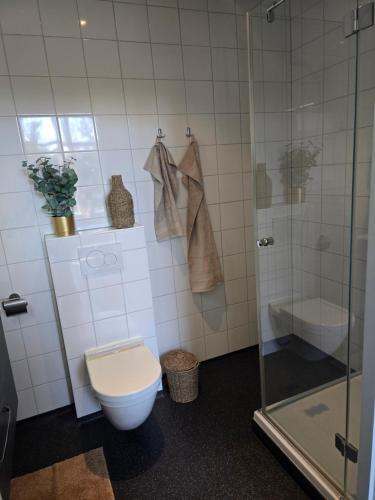 Koupelna v ubytování Hart van Warder