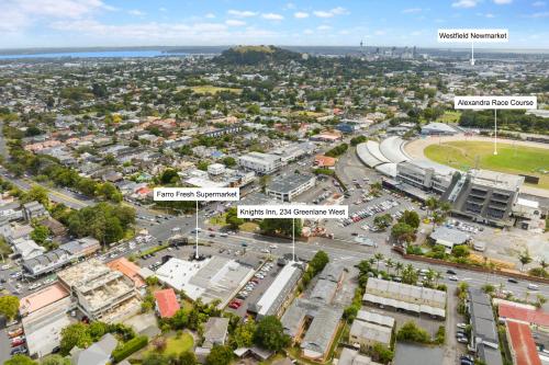 an aerial view of a city with streets and buildings at Knights Inn in Auckland