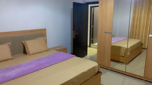 En eller flere senge i et værelse på Kinoise