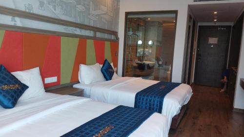 Postel nebo postele na pokoji v ubytování Apec Mui Ne - Dragonfly Condotel