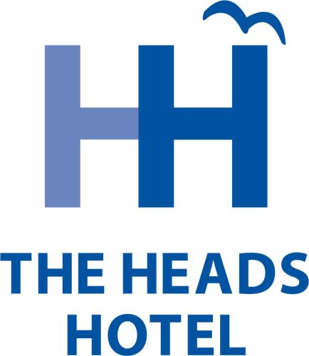 a logo for the heads the nets hotel at Shoalhaven Heads Motel in Shoalhaven Heads