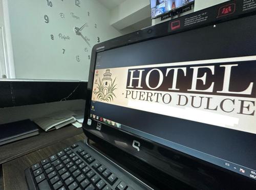 TV a/nebo společenská místnost v ubytování HOTEL PUERTO DULCE - La Virginia