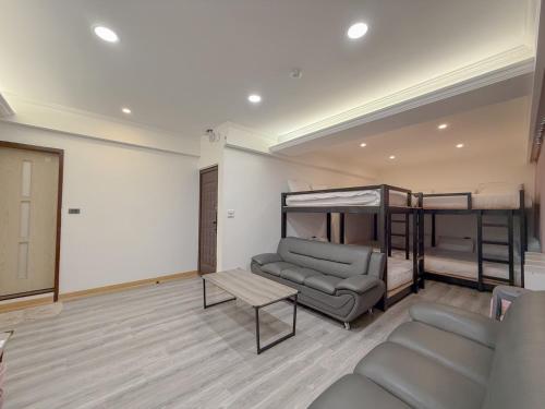 Katil atau katil-katil dalam bilik di Tamshui Homestay