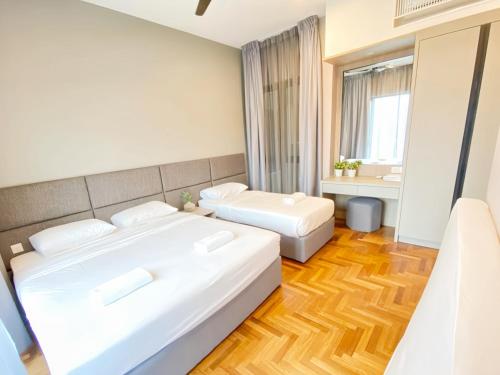 Ένα ή περισσότερα κρεβάτια σε δωμάτιο στο Vista Residence Genting Highlands