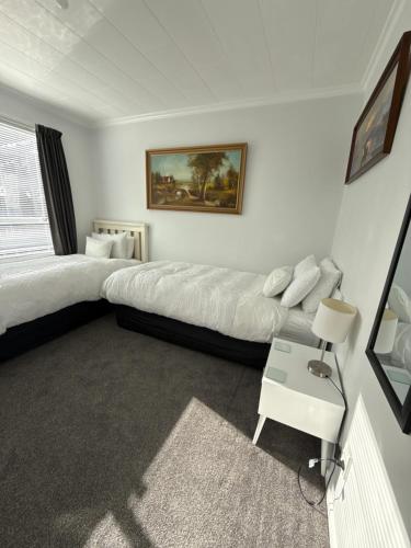 Katil atau katil-katil dalam bilik di Inglewood shared Home BNB