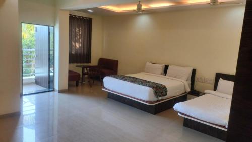 Fotografie z fotogalerie ubytování Hotel Lonavala Inn - Near Ekvira Devi Temple v destinaci Kārli