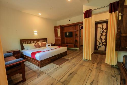 Postel nebo postele na pokoji v ubytování Agasthya Private Pool & Park villa