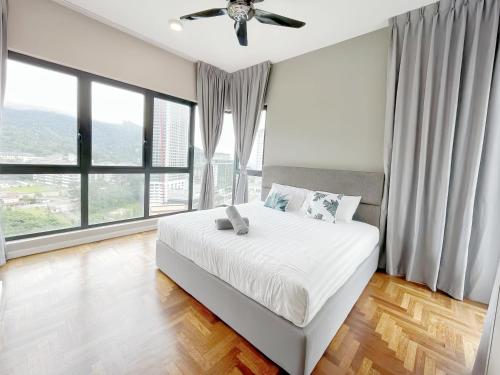 Ένα ή περισσότερα κρεβάτια σε δωμάτιο στο Vista Residence Genting Highlands