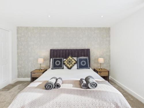 a bedroom with a bed with two night stands at Central Guest Room - En-Suite Parking in Birmingham