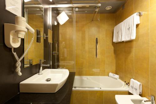 Koupelna v ubytování Hotel Alif Avenidas