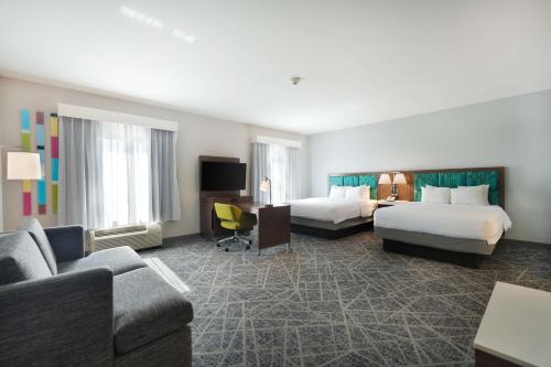 Ένα ή περισσότερα κρεβάτια σε δωμάτιο στο Hampton Inn and Suites Tulsa Central