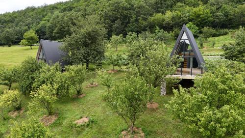 an overhead view of a small house in the trees at Fern Farm Tiny Home in Mojkovac