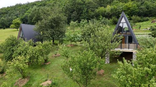 an overhead view of a house in the trees at Fern Farm Tiny Home in Mojkovac
