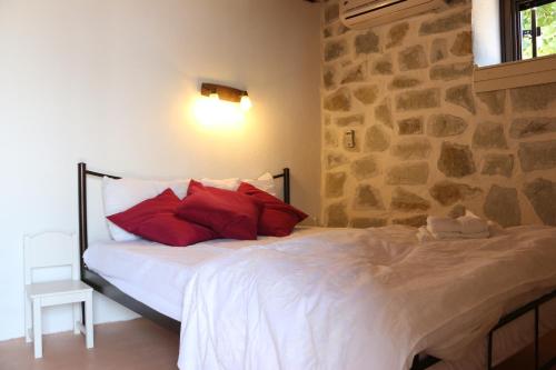 Postel nebo postele na pokoji v ubytování Villa Asterina